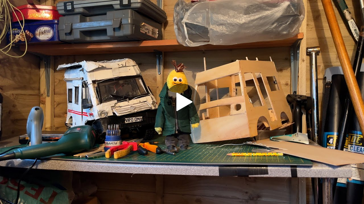 Vehicle models and tools cover a work table